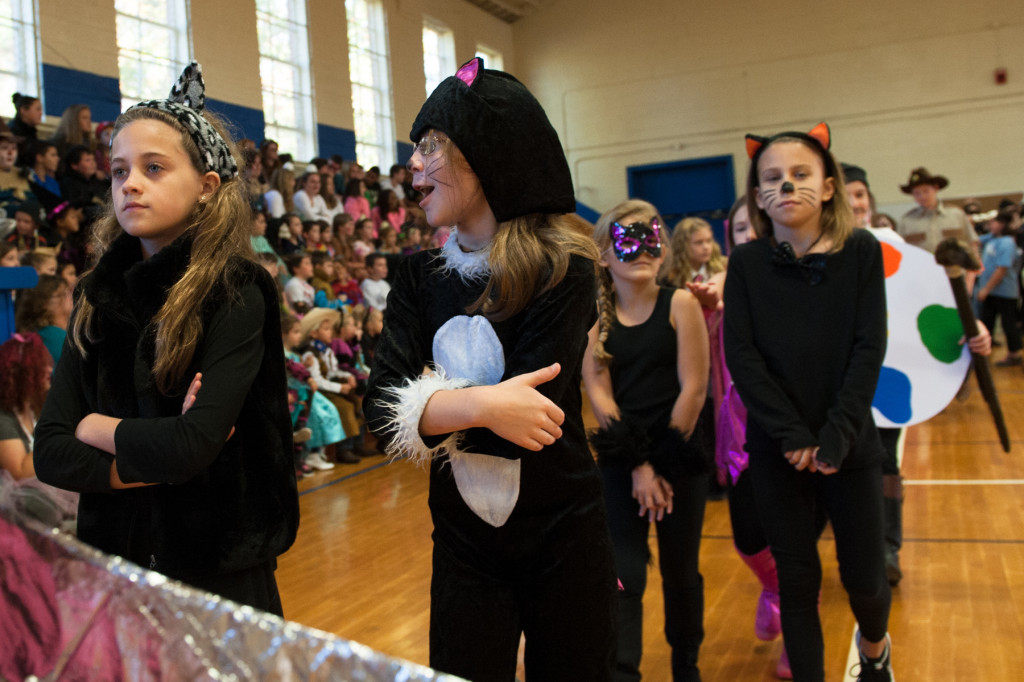 Students walk as various characters during the Halloween Costume parade in the gymnasium of High Falls Elementary School on Friday, October 30, 2015 in Robbins, North Carolina.