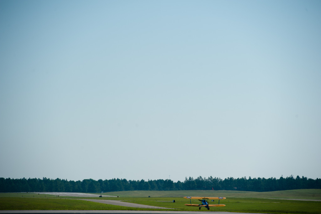 Pilot Darryl Fisher taxies with DeeDee Miller in the co-pilot seat as he takes her for her Ageless Aviation ride at the Moore County Airport on Tuesday, September 1, 2015 in Whispering Pines.