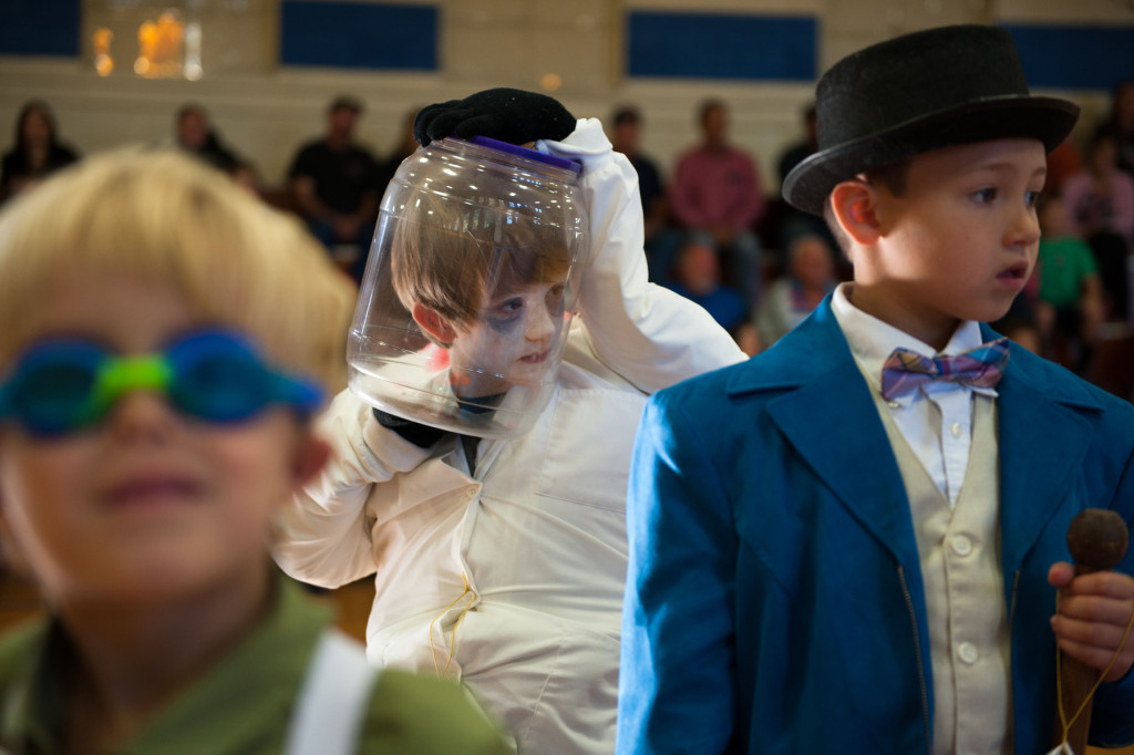 Jeremiah Britt (center) won first place for his Headless Scientist costume during the Halloween Costume parade in the gymnasium of High Falls Elementary School on Friday, October 30, 2015 in Robbins, North Carolina.