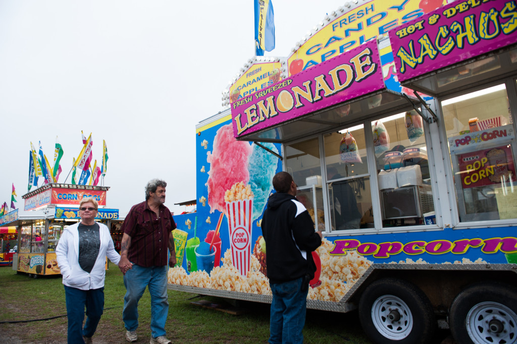 Patrons walk through the grounds at the Moore County Fair on Thursday, October 1, 2015 in Carthage, North Carolina.