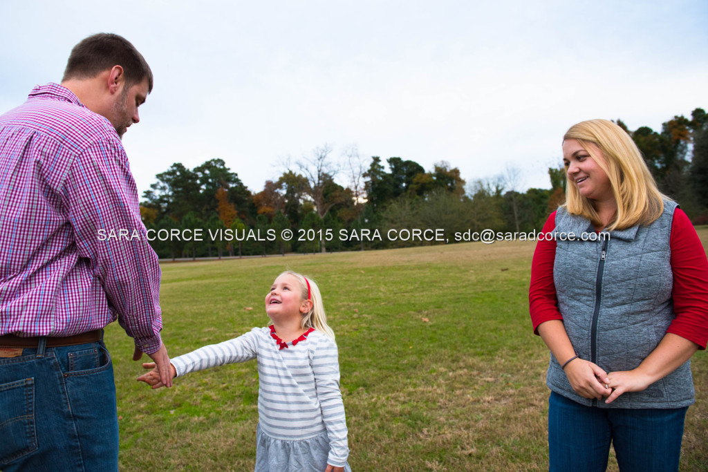 Greg and Lucy Noble stand for family portraits with their children Wesley and Kate at the Pinehurst Arboretum Park on Sunday, November 16, 2015 in Pinehurst, North Carolina.